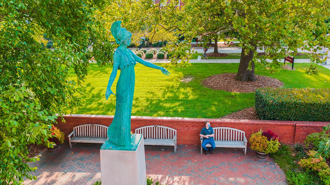 Photo of Minerva statue on the campus of UNCG