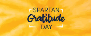 Yellow poster reading "Spartan Gratitude Day."