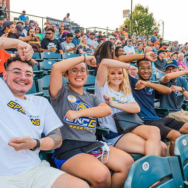 UNCG students at the Greensboro Grasshoppers game.