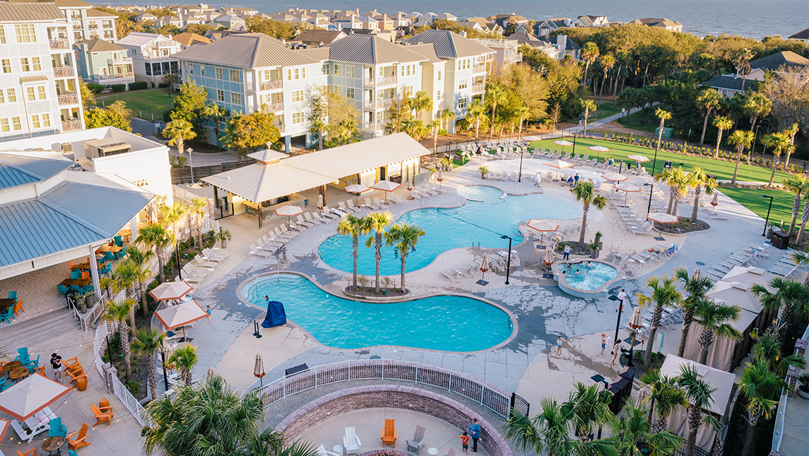 Overhead shot of the pool at a beach resort.