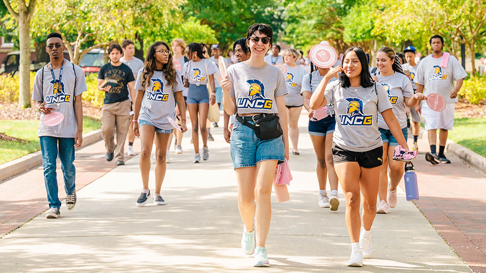 First Generation students tour on College Avenue.