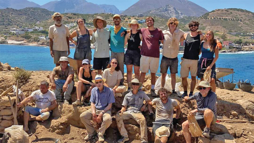 UNCG's Dr. Jeffrey Soles with his excavation team on the shore of the island of Mochlos.