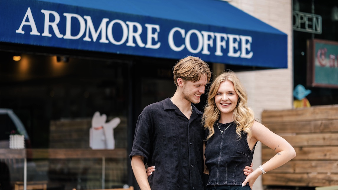 Leah Zubke, Bryan School alum and her business partner pose outside of their coffee shop, Ardmore Coffee.