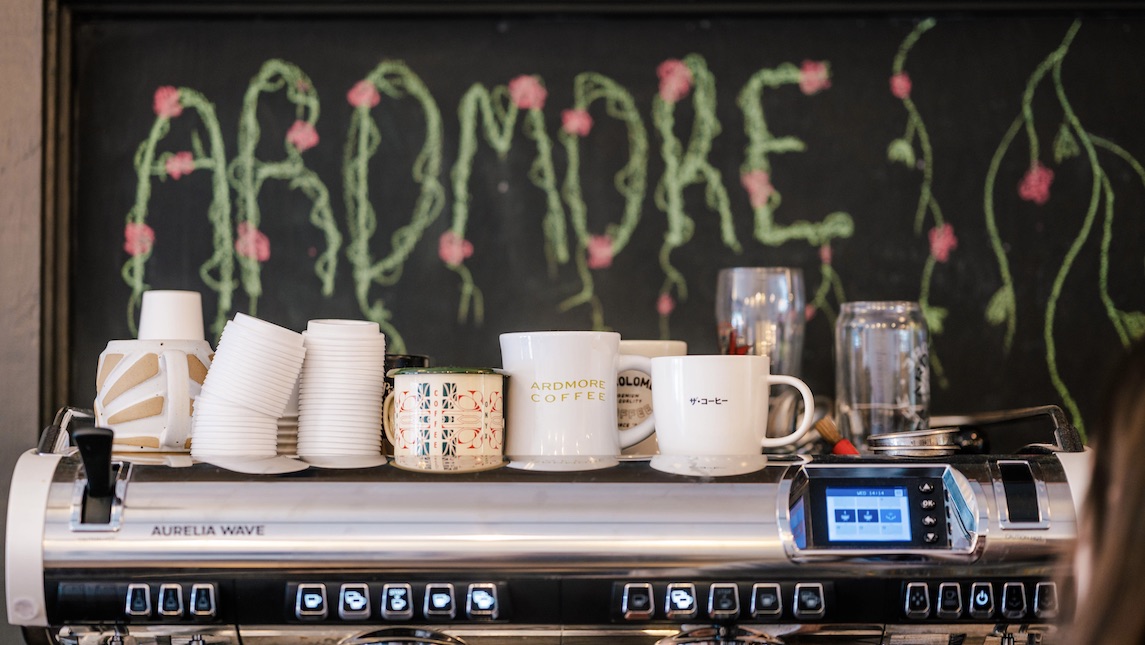 Photo of the counter space with coffee mugs at Ardmore Coffee.