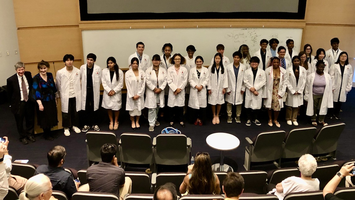 High schools students at UNCG JSNN for white coat ceremony.