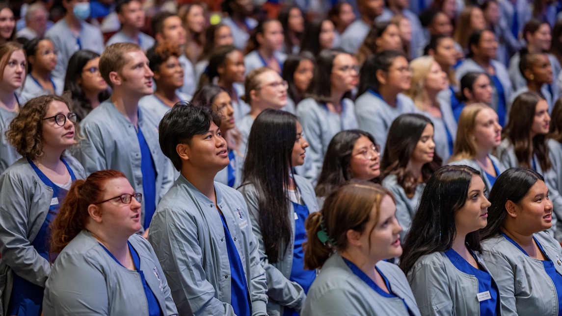 UNCG School of Nursing students gather for white coat ceremony.