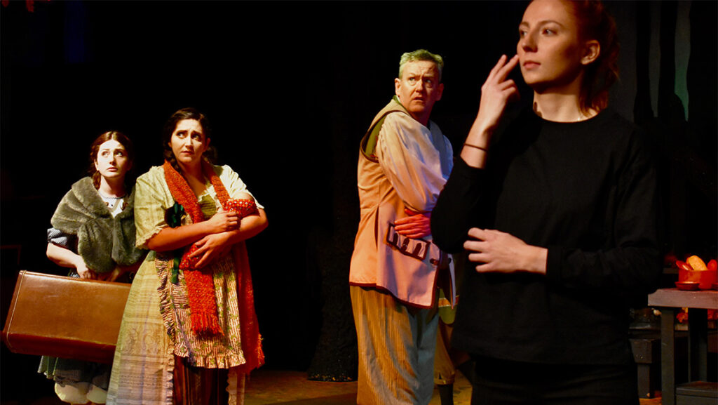 Studio 1 actors in period dress react in fear as an interpreter provides sign language.