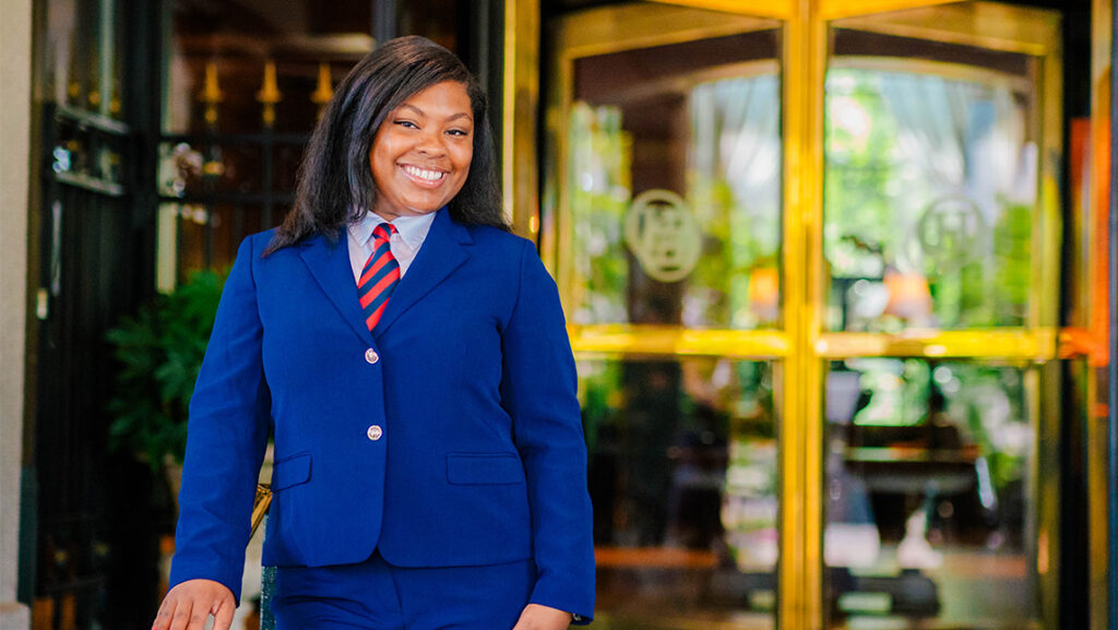 UNCG student Jasmyne Caudle stands outside the O.Henry Hotel.